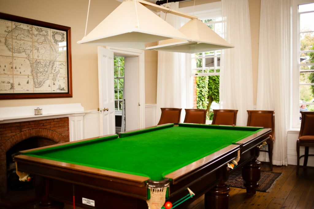 Activity room with pool table for relaxation